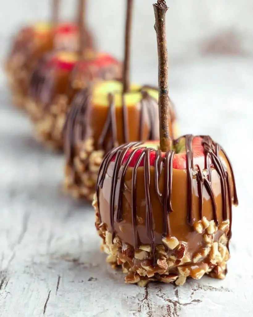 Sweet and Salty Bourbon Cinnamon Pecan Caramel Apples with Chocolate Drizzle Recipe