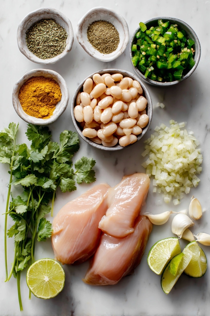Flat lay of boneless skinless chicken breasts, cans of white beans with some beans spilled out, diced green chiles in a small heap, minced garlic cloves, finely diced yellow onion, fresh cilantro sprigs, fresh lime wedges cut in halves and quarters, and ground cumin and dried oregano sprinkled in small piles, all beautifully arranged on a white marble surface, photo taken with an iphone --ar 2:3 --v 7 - Crockpot White Chicken Chili, slow cooker white chicken chili, creamy chicken chili recipe, easy white chicken chili, hearty chicken chili