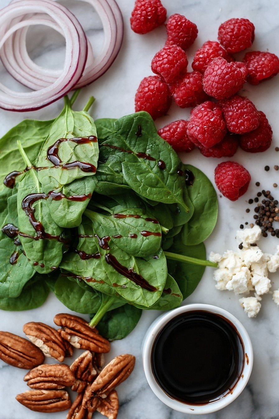 Flat lay of fresh baby spinach leaves, thinly sliced red onion rings, crumbled creamy goat cheese, toasted pecan halves, bright red fresh raspberries, a small pile of coarse black peppercorns, and a drizzle of dark balsamic glaze elegantly spread in a thin line, all beautifully arranged on a white marble surface, photo taken with an iphone --ar 2:3 --v 7 - Spinach Salad with Goat Cheese, Raspberries, and Toasted Pecans,healthy raspberry spinach salad,easy gourmet salads,fresh spinach salad recipes,nutty berry salad