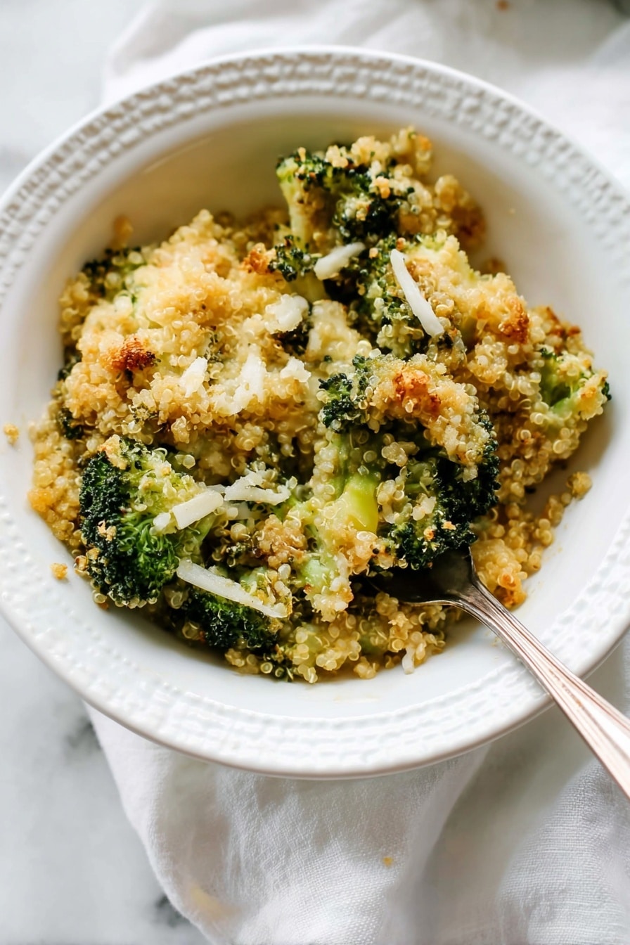 A white bowl holds a serving of broccoli quinoa casserole with three visible layers: at the bottom is a soft, light green layer of small broccoli florets, followed by a layer of fluffy beige quinoa mixed with broccoli, and topped with a golden-brown crumbly layer mixed with melted cheese and crispy bits. A silver fork pierces into the top layer, lifting a piece of broccoli covered with the crunchy topping. In the background, a white casserole dish with more broccoli quinoa bake is partially visible on a white marbled surface with some crumbs scattered around. Photo taken with an iphone --ar 2:3 --v 7 - Better Broccoli Casserole, healthy broccoli casserole, cheesy broccoli bake, quinoa broccoli casserole, easy vegetable casserole