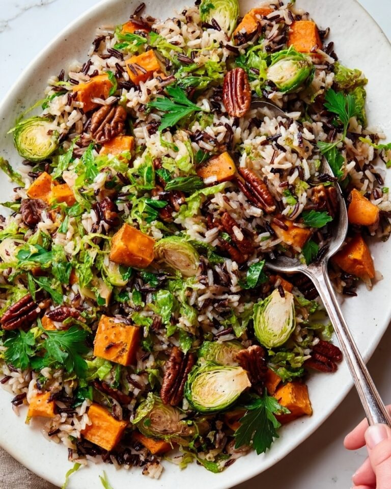 Wild Rice Pilaf with Roasted Sweet Potatoes, Cranberries, and Pecans Recipe