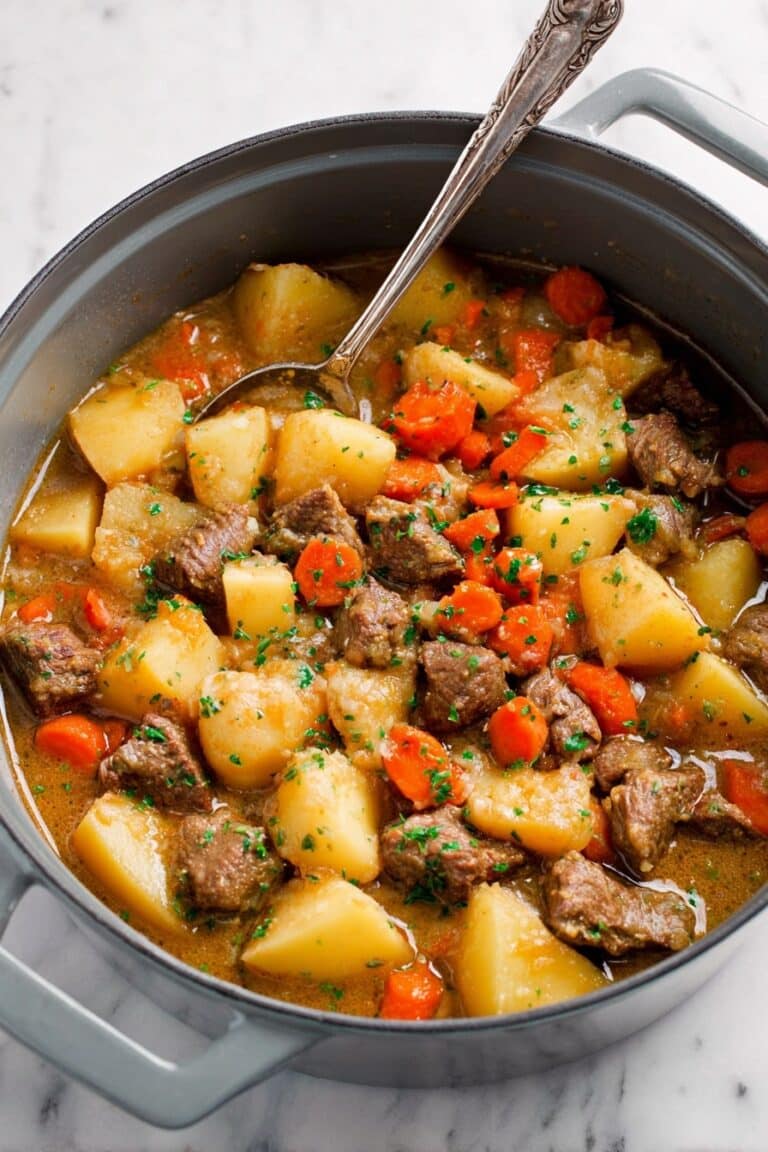 Hearty Oven-Braised Lamb Stew with Mushrooms, Potatoes, and Carrots Recipe