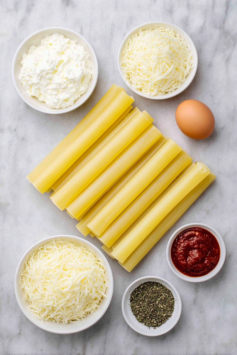 Flat lay of uncooked manicotti pasta tubes arranged neatly, a small white ceramic bowl with creamy ricotta cheese, a small white bowl filled with shredded mozzarella cheese, a small white bowl containing shredded parmesan cheese, a whole uncracked brown egg, a small white bowl with bright red spaghetti sauce, and a small white bowl with dried basil and parsley flakes sprinkled side by side, all ingredients fresh and natural, placed on a clean white marble surface, soft natural light, photo taken with an iPhone, professional food photography style, fresh ingredients, white ceramic bowls, no bottles, no duplicates, no utensils, no packaging --ar 2:3 --v 7 --p m7354615311229779997 - Cheese Manicotti Marinara Sauce, Italian Cheese Manicotti, Easy Baked Manicotti, Vegetarian Italian Pasta, Classic Italian Manicotti