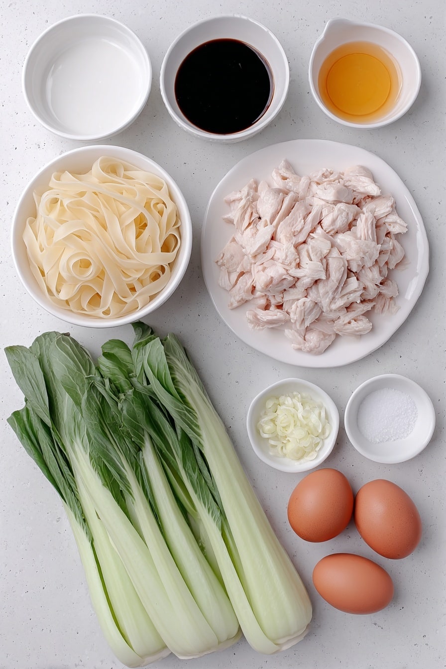 Flat lay of a small pile of fresh wide flat rice noodles (Sen Yai), two small white ceramic bowls containing dark soy sauce and oyster sauce, another small white bowl with light soy sauce, a small white bowl with white vinegar, a small white bowl with sugar crystals, three tablespoons of peanut oil in a small white bowl, two whole uncracked brown eggs, two peeled garlic cloves finely chopped and displayed in a small white bowl, a portion of raw sliced boneless skinless chicken thighs arranged neatly on a simple white ceramic plate, and four fresh Chinese broccoli stems with vibrant green leaves and crisp stalks laid out beside them, all placed on a clean white marble surface, soft natural light, photo taken with an iPhone, professional food photography style, fresh ingredients, white ceramic bowls, no bottles, no duplicates, no utensils, no packaging --ar 2:3 --v 7 --p m7354615311229779997 - Authentic Thai Pad See Ew with Chicken, Thai noodle stir-fry recipe, easy Thai chicken stir-fry, homemade Pad See Ew, Thai street food at home