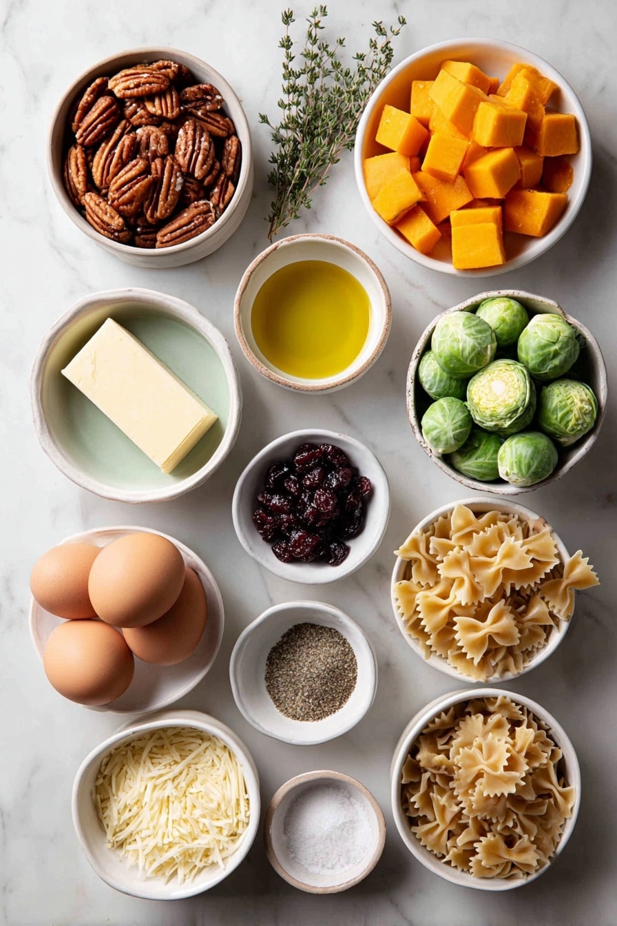 Flat lay of raw pecans in a small white ceramic bowl, a handful of fresh Brussels sprouts trimmed and thinly sliced, roughly cubed bright orange butternut squash pieces in a small white bowl, a small white bowl with golden extra-virgin olive oil, a small white bowl containing a stick of unsalted butter, whole uncracked brown eggs with smooth clean shells, a few sprigs of fresh thyme, a small white bowl with dried dark red cherries, small white bowl with freshly squeezed pale yellow lemon juice, a small white bowl with freshly grated Parmesan cheese, a cluster of uncooked whole wheat penne pasta, a small white bowl holding kosher salt crystals, and a small white bowl with ground black pepper, all arranged symmetrically and balanced, placed on a clean white marble surface, soft natural light, photo taken with an iPhone, professional food photography style, fresh ingredients, white ceramic bowls, no bottles, no duplicates, no utensils, no packaging --ar 2:3 --v 7 --p m7354615311229779997 - Brussels Sprouts Pasta with Brown Butter, Brussels sprouts pasta, fall pasta recipes, cozy vegetable pasta, caramelized Brussels sprouts recipes