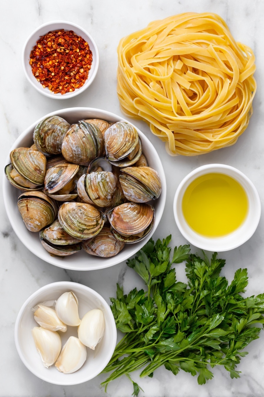 Flat lay of fresh linguine pasta neatly coiled, a cluster of glossy fresh clams in their shells, several whole uncracked garlic cloves with smooth white skins, a small white ceramic bowl holding bright red finely chopped peperoncino flakes, another small white bowl filled with golden extra virgin olive oil, a handful of vibrant green fresh parsley sprigs, and a small white bowl containing pale dry white wine, all arranged with perfect symmetry on a clean white marble surface, soft natural light, photo taken with an iPhone, professional food photography style, fresh ingredients, white ceramic bowls, no bottles, no duplicates, no utensils, no packaging --ar 2:3 --v 7 --p m7354615311229779997 - Linguine with Clams, Italian seafood pasta, easy clam pasta recipe, fresh clam pasta, seafood linguine