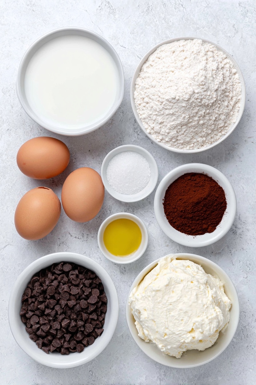 Flat lay of a small white ceramic bowl of whole milk, a small white ceramic bowl with white vinegar, a small white ceramic bowl with golden vegetable oil, a small white ceramic bowl of all-purpose flour, a small white ceramic bowl of deep reddish-brown cocoa powder, a small white ceramic bowl of light brown sugar, two whole uncracked brown eggs with clean shells, a small white ceramic bowl of white baking powder, a small white ceramic bowl of fine white salt, a small white ceramic bowl of creamy white cream cheese, a small white ceramic bowl of fine white icing sugar, a small white ceramic bowl of mini dark chocolate chips placed symmetrically on a clean white marble surface, soft natural light, photo taken with an iPhone, professional food photography style, fresh ingredients, white ceramic bowls, no bottles, no duplicates, no utensils, no packaging --ar 2:3 --v 7 --p m7354615311229779997 - Red Velvet Mug Cake, microwave mug cake, quick red velvet dessert, easy mug cake recipe, indulgent single-serving cake