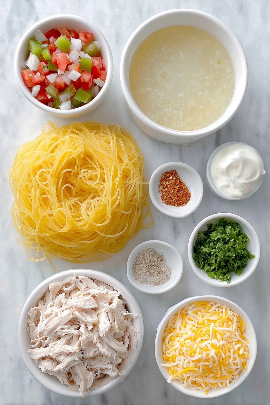 Flat lay of dry spaghetti pasta nest, two cans of cream of chicken soup opened with creamy soup visible, a small white bowl of diced fresh red and green tomatoes with jalapeños (representing Rotel), a small white bowl of thick sour cream, a small white bowl of clear chicken broth, a small white bowl filled with shredded Mexican cheese blend, a small white bowl of mixed garlic powder and onion powder, a small white bowl containing coarse salt and black pepper, a small white bowl with crushed red pepper flakes, a small pile of shredded rotisserie chicken breast, and a small white ceramic dish with freshly chopped parsley, all arranged symmetrically and proportionately on a clean white marble surface, soft natural light, photo taken with an iPhone, professional food photography style, fresh ingredients, white ceramic bowls, no bottles, no duplicates, no utensils, no packaging --ar 2:3 --v 7 --p m7354615311229779997 - Cheesy Chicken Spaghetti Bake, chicken spaghetti casserole, cheesy pasta bake, easy chicken pasta dinner, comfort food recipes