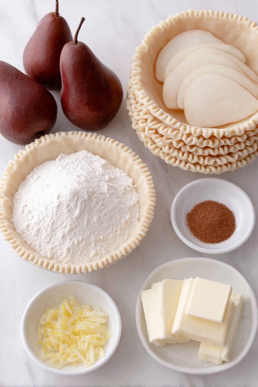 Flat lay of fresh peeled and sliced Bosc pears arranged in a neat pile, a small mound of white granulated sugar, a small bowl of all-purpose flour, a few small piles of ground cinnamon and fine salt, a few strips of bright yellow lemon zest, a small diced pat of golden butter, a small white bowl with fresh lemon juice, and two perfectly whole, uncracked brown pie crusts stacked with visible folded edges, all placed on simple white ceramic bowls and plates arranged symmetrically, placed on a clean white marble surface, soft natural light, photo taken with an iPhone, professional food photography style, fresh ingredients, white ceramic bowls, no bottles, no duplicates, no utensils, no packaging --ar 2:3 --v 7 --p m7354615311229779997 - Easy Pear Pie, pear dessert, easy fruit pie, cinnamon pear pie, quick pear dessert