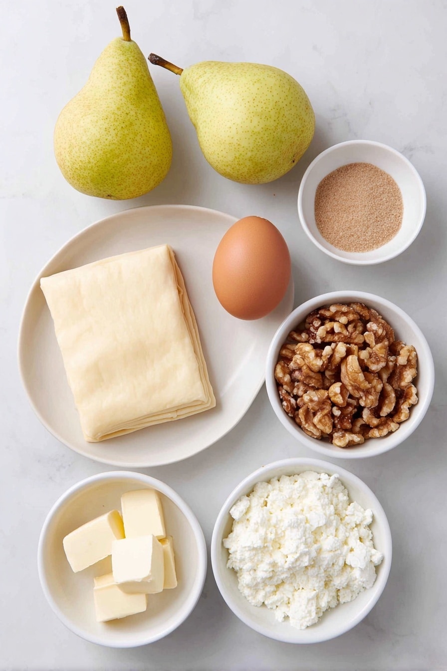 Flat lay of a sheet of thawed puff pastry cut into four squares on a simple white ceramic plate, two fresh ripe pears—one whole and one sliced into quarters and thin slices, a small white bowl of unsalted butter cubes, a small white bowl filled with lightly packed brown sugar, a small white bowl with a pinch of salt, one whole uncracked brown egg with a clean shell, a small white bowl of creamy crumbled blue cheese (gorgonzola), and a small white bowl containing roughly chopped walnuts, all arranged with perfect symmetry and balanced proportions, placed on a clean white marble surface, soft natural light, photo taken with an iPhone, professional food photography style, fresh ingredients, white ceramic bowls, no bottles, no duplicates, no utensils, no packaging --ar 2:3 --v 7 --p m7354615311229779997 - Caramelized Pear and Blue Cheese Tart, pear and blue cheese tart, caramelized pear tart, blue cheese pastry tart, easy savory tart