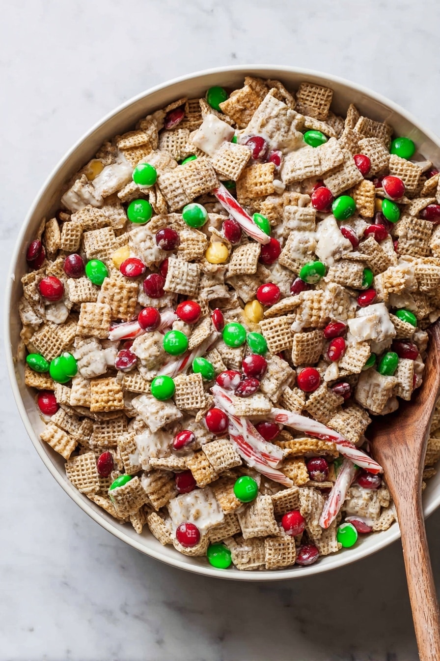 A large white bowl filled with a colorful snack mix showing a mix of light brown square cereal pieces, white-coated sticks, and red and green candy-coated chocolates scattered evenly throughout. The texture is crunchy with clusters of cereal and white coating binding some pieces together. A light brown wooden spoon is partially buried inside the mix on the right side of the bowl. The bowl sits on a white marbled surface. photo taken with an iphone --ar 2:3 --v 7 - Chex Christmas Mix, Festive holiday snack, Easy Christmas treats, Sweet and salty snack mix, Holiday party snack ideas