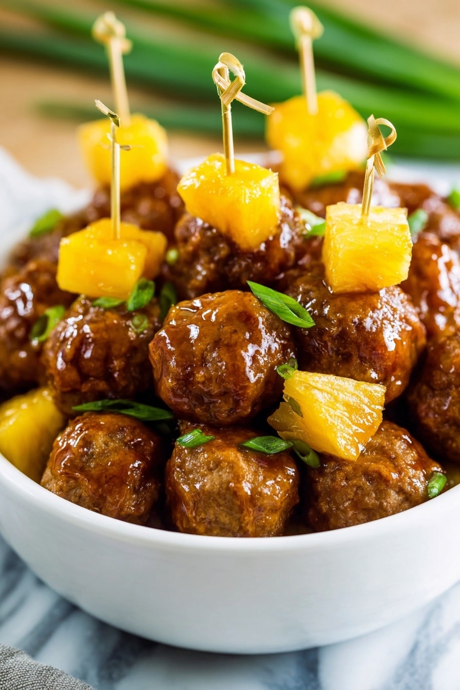 A white bowl filled with meatballs covered in a shiny brown sauce, mixed with bright yellow pineapple cubes. Some meatballs are pierced with small picks holding a pineapple cube on top. Scattered on the meatballs and pineapples are small pieces of green onion. The bowl sits on a white marbled surface with green onions blurred in the background photo taken with an iphone --ar 2:3 --v 7 - Teriyaki Meatballs with Pineapple, easy teriyaki meatballs, pineapple meatball recipe, sweet and savory meatballs, quick dinner ideas