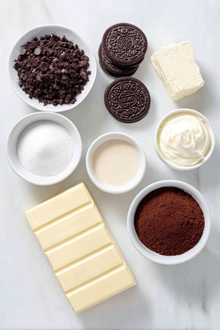 Flat lay of a small mound of crushed Oreo cookie crumbs, a few whole Oreo cookies, a pat of unsalted butter, a handful of glossy semisweet chocolate chips, two blocks of cream cheese with smooth surfaces, a small white bowl of granulated sugar, a small white bowl with pale creamy Baileys Irish Cream, a small white bowl of vanilla extract, two small white bowls of heavy whipping cream—one at room temperature and one visibly chilled with slight condensation, a small white bowl of unsweetened cocoa powder, and a small white bowl of confectioners’ sugar, all arranged with perfect symmetry on a clean white marble surface, soft natural light, photo taken with an iPhone, professional food photography style, fresh ingredients, white ceramic bowls, no bottles, no duplicates, no utensils, no packaging --ar 2:3 --v 7 --p m7354615311229779997 - Baileys Chocolate Cheesecake Cups, chocolate cheesecake dessert, no-bake Baileys dessert, Oreo cheesecake cups, boozy chocolate treat