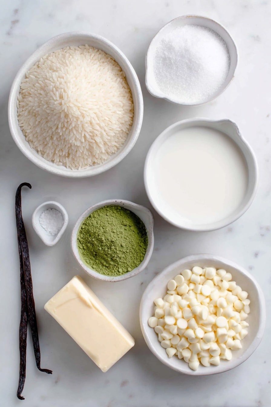 Flat lay of a small mound of uncooked arborio rice, a small white ceramic bowl of clear water, a larger white ceramic bowl filled with fresh whole milk, a small white ceramic bowl of white granulated sugar, a small white ceramic bowl containing vibrant green matcha powder, a small pat of soft pale yellow butter, a single vanilla bean pod, a small white ceramic bowl of thick sweetened condensed milk, a small pinch of coarse salt crystals, and a small white ceramic bowl filled with white chocolate chips, all perfectly arranged with balanced symmetry and realistic proportions, placed on a clean white marble surface, soft natural light, photo taken with an iPhone, professional food photography style, fresh ingredients, white ceramic bowls, no bottles, no duplicates, no utensils, no packaging --ar 2:3 --v 7 --p m7354615311229779997 - Matcha Rice Pudding, matcha dessert recipes, green tea pudding, easy rice pudding, comforting matcha treat